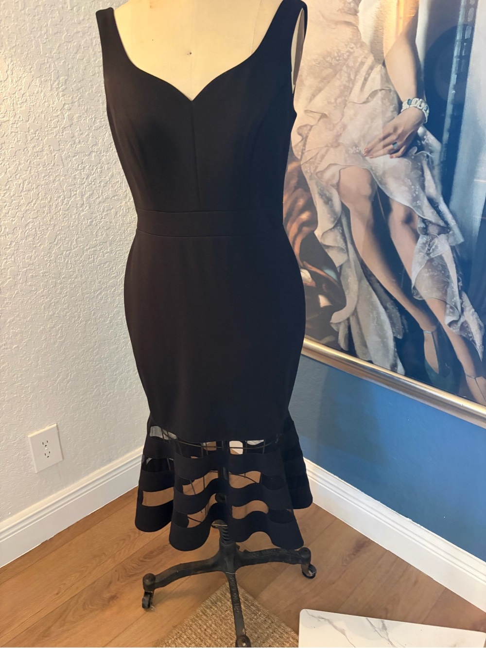 Black Sleeveless Midi Dress with Flared Cutout Hem